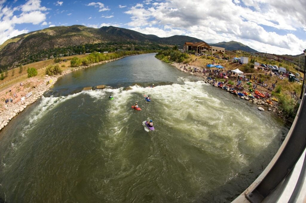 Glenwood Whitewater Park // Discover the best places to SUP in Colorado this summer with the best Rocky Mountain views, calm waters, and quiet solitude.